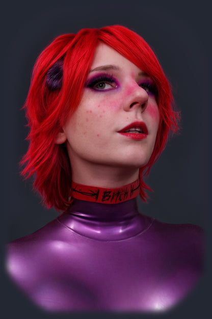 Red latex collar worn over a purple latex catsuit, upper-body